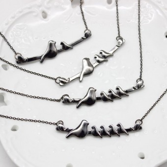 Pendentif maman oiseau et...